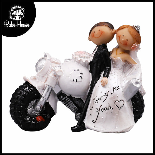 Just Married Bride And Groom On Bike Cake Topper