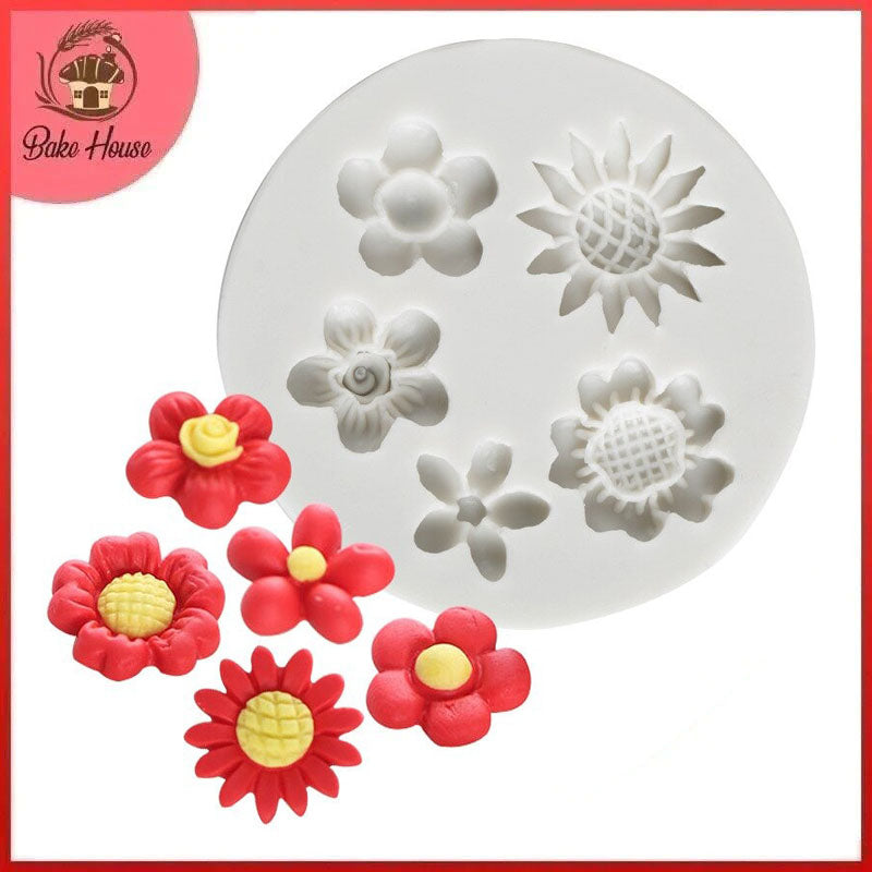 http://bakehouse.pk/cdn/shop/files/5-Cavity-Different-Flowers-Silicone-Fondant-Mold.jpg?v=1689258745