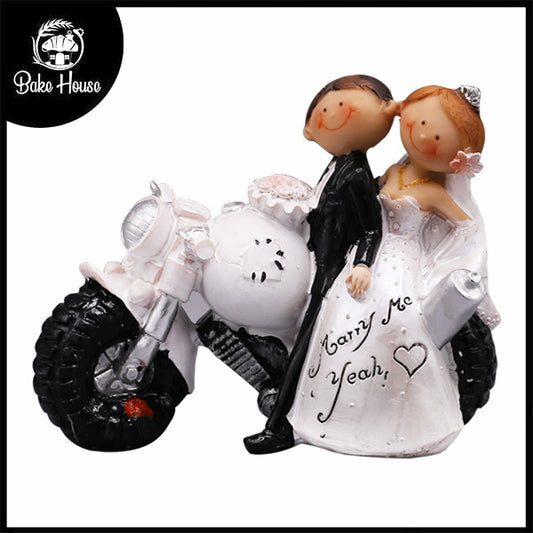 Just Married Bride And Groom On Bike Cake Topper