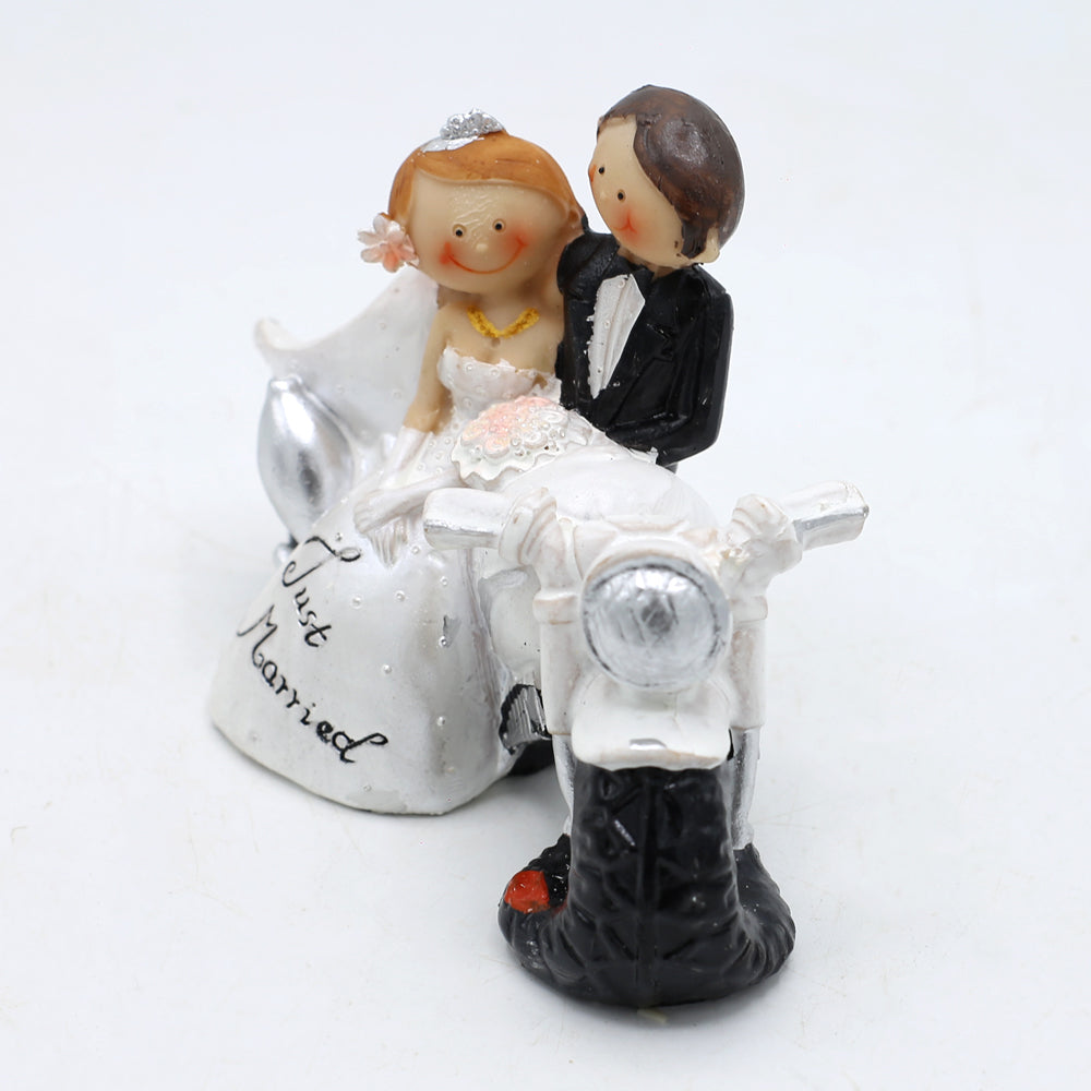 Just Married Bride And Groom On Bike Cake Topper
