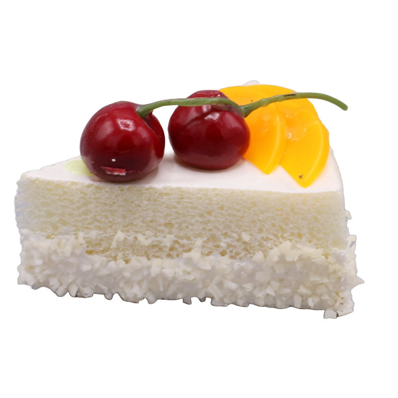 Realistic Artificial Vanilla Triangle Pastry With Cherry And Mangoes Topping