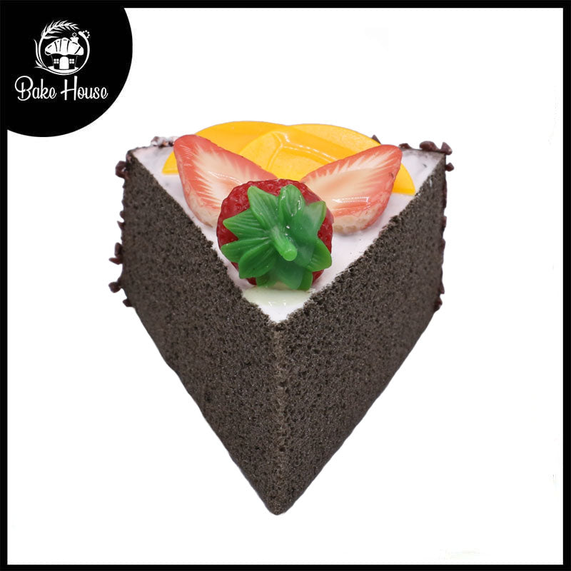 Realistic Artificial Chocolate Triangle Pastry With Mangoes And Strawberry Topping