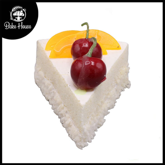 Realistic Artificial Vanilla Triangle Pastry With Cherry And Mangoes Topping