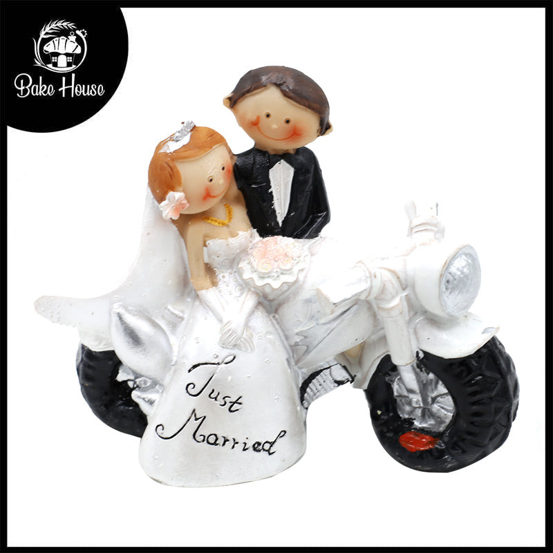 Just Married Bride And Groom On Bike Cake Topper